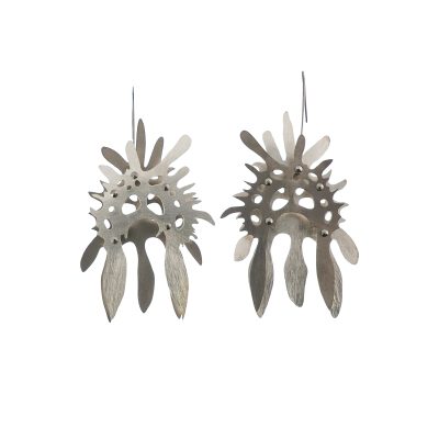 Zygospyrida Ceratospyris Preyeri earrings inspired by the microscopic sea creature of the same name. Top layer of this the earring on the left is made from low tarnish sterling silver. Bottom layer is made from pure grade 2 titanium. The 2 layers are joined with stainless steel fasteners. The earrings on the right is made of the same shapes with the materials swapped front to back.