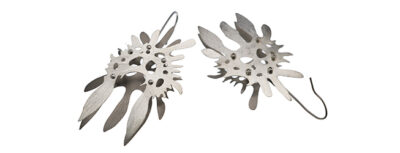 closeup view of the front and back of a pair of the Zygospyrida Ceratospyris Preyeri one-of-a-kind low tarnish sterling silver, titanium and stainless steel earrings by Sherry Cordova