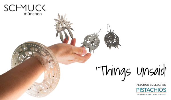 Schmuck Munchen exhibition 'Things Unsaid' hosted by Precious Collective and Pistachios Contemporary Art Jewelry features the CIPI bracelet shown here on an arm, a brooch and a pair of earrings made of low tarnish sterling silver and pure titanium